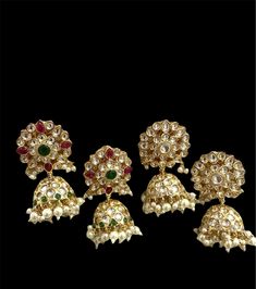 Sabyasachi Inspired Uncut Polki Kundan Designer Earrings. Gold plated. Gorgeous high quality sparkly kundan designer dangle drop earrings. It increased the effect of Royal look and beauty.  Available in 2 colours, multicolour and gold Length 6cm If have any queries please ask. Party Chandbali Jhumkas Hand Set, Hand Set Chandbali Jhumkas For Party, Festive Hand Set Jhumkas For Party, Traditional Hand-set Jhumkas For Parties, Hand Set Temple Jewelry Jhumkas For Party, Traditional Drop Jhumkas For Reception, Hand-set Jhumkas For Reception And Festivals, Hand Set Jhumkas For Reception And Festivals, Kundan Jhumkas With Latkans For Reception