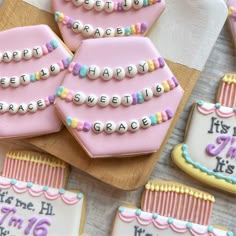 some decorated cookies are sitting on a table