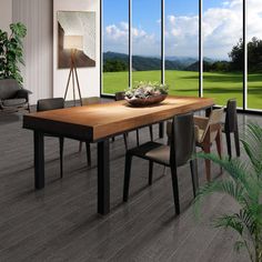 a dining room with large windows overlooking the golf course