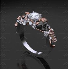 a black diamond ring with roses on it