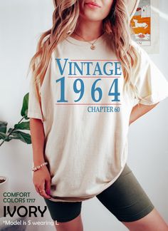 Classic 1964 Shirts For Women, Vintage 60th Birthday Year Number Tshirt For Him, Cute 60th Milestone Best Friend 60 Bday T-Shirt For Her HOW TO ORDER ➀ Select color ➁ Select the size (Please check size chart) ✦ True to size. Size up 1-2 sizes for an oversized look. ➂ Add to cart ✦ (Optional) "Add message to Seller" on the checkout page. GARMENT FEATURES ✦ Crew neckline ✦ Direct to garment printing - no vinyl, decal, or iron-on technique ✦ Our designs are printed on the garment to last a long time and may not appear as 'glossy' or saturated as iron-on designs are. ✦ Please note that colors may appear different on different digital screens and may not be a true representation of the actual colors. ✦ Additional T-Shirt Colors and Sizes Available Upon Request ✧✧Brands: Bella Canvas Unisex 3001 The 1975 Shirt, 1984 Shirt, Bday Shirt, Bday Gift, Shirts For Women, Women Vintage, 30th Birthday, Birthday Shirts, Comfort Colors