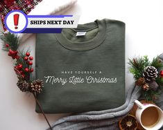 Have Yourself A Merry Little Christmas Sweatshirt& Hoodie, Womens Christmas Tee, Minimal Christmas Sweatshirt, Merry Christmas Sweatshirt Product Features Material: Crafted from a premium 50/50 blend of cotton and polyester, our apparel offers the ideal combination of comfort and warmth. The soft, breathable fabric ensures you remain cozy without feeling weighed down, making it a perfect choice for any season. Fit: Designed with unisex sizing, our apparel provides a relaxed, comfortable fit for everyone. Whether you're lounging at home or out and about, you'll appreciate the easygoing style and versatility of this piece. Specifications: Weight: 8.0 oz./yd² (271.25 g/m²) Air Jet Yarn: This technology ensures a softer feel and significantly reduces pilling, keeping your apparel looking fresh Christmas Cotton Hoodie With Crew Neck, Christmas Cotton Crew Neck Hoodie, Minimal Christmas, Womens Christmas, Merry Little Christmas, Youth Hoodies, Christmas Tees, Christmas Women, Air Jet