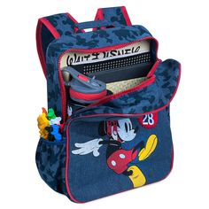 Add a skip to their step with this junior backpack featuring an exuberant Mickey jumping for joy. The denim design includes an exterior zip pocket, appliqué patches, and a Mickey silhouette print that will shadow them wherever they go. Safety WARNING: CHOKING HAZARD - Small Parts. Not for children under 3 years. CAUTION: Entanglement hazard. Keep away from very young children. Do not place around neck. Magic in the details Small backpack Mickey screen art ''The Mouse'' and ''28'' applique patche Casual Mickey Mouse School Backpack, Casual Mickey Mouse Backpack For Back To School, Casual Mickey Mouse Backpack, Mickey Silhouette, Screen Art, Denim Backpack, Disney Boys, Jumping For Joy, Small Backpack