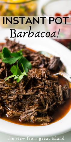 instant pot barbacoa on a white plate with garnished cilantro