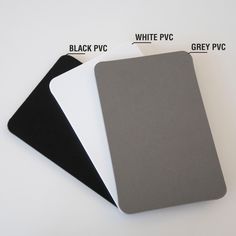 three different types of black and white paper on top of each other, with the same color