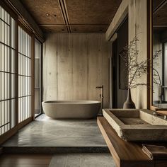 a bathroom with a large bathtub next to a window