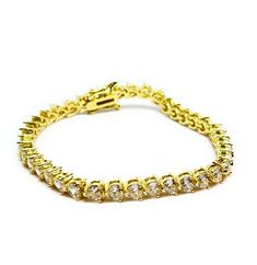 18K Gold Plated Cubic Zirconia Heart Tennis Bracelet 7.25” Length5MM Cubic Zirconia AAA Quality Cubic Zirconia Lead and Nickel Free Gift Box Included..Express Shipping Options Are Available Message Us For Details 100% SATISFACTION GUARANTEE! - 100% no-questions-asked, you'll-totally-love-it-or-you-get-all-your-money-back guarantee. we want you to be happy with your purchase! If there is a problem with your product we would love the chance to make it right. If you have simply changed your mind, p Classic Gold Cubic Zirconia Bracelet, Gold Heart Bracelet With Diamond Accents, Dazzling Gold Bracelet As Gift, Gold Cubic Zirconia Tennis Bracelet Hand Set, Classic Gold Bracelet With Hand Set Cubic Zirconia, Gold Cubic Zirconia Heart Bracelet For Wedding, Formal Cubic Zirconia Heart Bracelet, Gold Tennis Bracelet Hand Set Fine Jewelry, Dazzling Gold Cubic Zirconia Bracelet