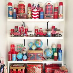 a shelf filled with lots of red and blue items