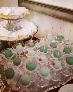 there are many desserts on the table ready to be eaten and served for guests