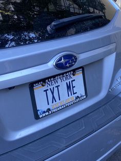 a close up of a license plate on a car