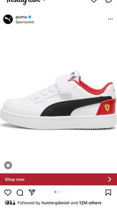 a pair of white and red shoes with black detailing on the soles, which are also