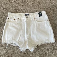 Nwt Abercrombie & Fitch Annie High Rise Shorts In Distressed White White Fitted Bottoms With Frayed Hem, Fitted White Bottoms With Frayed Hem, White Relaxed Fit High-waisted Shorts, White Cutoff Summer Bottoms, White High Rise Fitted Shorts, White Summer Shorts With Frayed Hem, White High Waist Shorts With Frayed Hem, White Frayed Hem Summer Shorts, White High-waisted Shorts With Frayed Hem