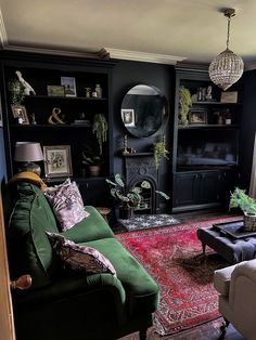 a living room filled with furniture and a fire place