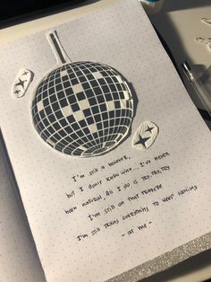 a notepad with an image of a disco ball on it and the words i am sorry to you written in cursive writing