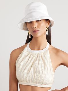 Chic Curved Brim Bucket Hat For Day Out, Chic Summer Bucket Hat, Chic Spring Bucket Hat, Chic White Bucket Hat With Curved Brim, Chic Spring Bucket Hat With Flat Brim, Chic Flat Brim Bucket Hat For Spring, Chic White Adjustable Bucket Hat, Chic Adjustable White Bucket Hat, Chic Fitted Bucket Hat