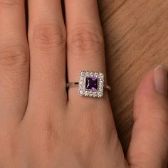 It is a natural amethyst ring, princess cut, measures 5mm*5mm, weight about 0.7 cts. The basic metal is sterling silver and plated with rhodium. To change the metal to a solid gold (white/rose) or platinum is also available, please ask for a quotation if you want. You can also go to my shop Home for more elegant rings: https://www.etsy.com/shop/godjewelry?ref=hdr_shop_menu amethyst is birthstone of February More amethyst rings: https://www.etsy.com/shop/godjewelry?ref=seller-platform-mcnav&s Square Cut Amethyst Ring For Formal Occasions, Elegant Formal Princess Cut Amethyst Ring, Princess Cut Amethyst Jewelry Gift, Amethyst Engagement Rings, Engagement Rings Princess Cut, Rings Princess Cut, Nickel-free Amethyst Rings As Gifts, Heart-shaped Sterling Silver Amethyst Birthstone Ring, Amethyst Rings