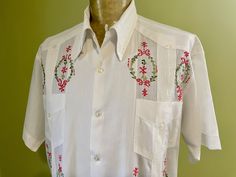 A real stunner this traditional short sleeve Mexican Guayabera shirt in in crisp white has fine details of pleats and floral embroidery on the front and the back.  It has four front patch pockets and waist detailing. Size 3XL Measurements: Chest: 132 cm / 52 inches Length: 76 cm / 30 inches Shoulders: 55 cms / 22 inches                                                                                                                  Sleeve: 24 cms / 9 inches This item is one of a kind. BUYING VINTAGE:                                                                                                                                          While all care is taken to state any obvious faults, please note that when you buy a vintage or preloved item, they may show small signs of ageing, wear and/o Aran Cardigan, Guayabera Shirt, Vintage Tea Towels, Linen Tea Towel, Vintage Vans, Wool Cardigan, Vintage Wool, Guys And Girls, Floral Embroidery