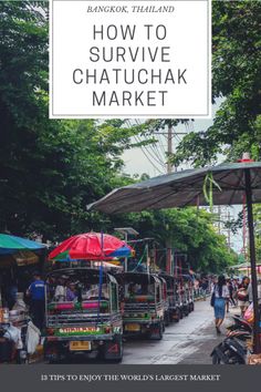 an outdoor market with lots of food and umbrellas on the side of the road