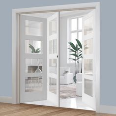 an open door leading to a bathroom with a potted plant