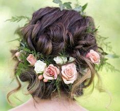 a woman with flowers in her hair