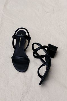 "INTENTIONALLY __________." KIMI SANDAL - BLACK LEATHER Modern Black Slingback Sandals With Block Heel, Black Sleek Slingback Sandals With Low Heel, Black Sleek Low Heel Slingback Sandals, Black Sleek Open Heel Slingback Sandals, Sleek Black Slingback Sandals With Padded Heel, Sleek Black Slingback Sandals With Open Heel, Black Leather Slingback Sandals With Contrasting Heel, Black Slingback Sandals With Padded Heel, Modern Black Slingback Sandals With Heel Loop