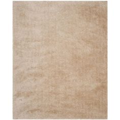 a beige area rug on a white background with no one in it or someone else