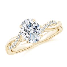 a yellow gold engagement ring with an oval cut diamond in the center and side stones