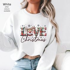 Celebrate the most wonderful time of the year in style with our Love Christmas sweatshirt! Featuring a cute reindeer head as the "O" in Love, this charming design is perfect for adding some holiday cheer to your winter wardrobe. Whether you're attending a festive gathering, lounging by the fire, or wrapping presents, this Christmas Sweatshirt is the ideal blend of comfort and style. Its oversized fit gives that casual chic vibe, making it a must-have cozy jumper for the season. Crafted from soft Cute White Christmas Sweatshirt, Cute White Christmas Sweater, Cute Christmas Sweatshirt With Letter Print, Cozy Jumper, Reindeer Head, Reindeer Sweater, Wrapping Presents, Winter Jumpers, Cozy Holiday