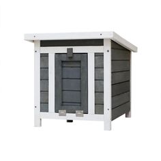 an outdoor dog house made out of wood and painted white with grey trimmings