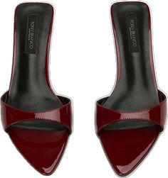 Sleek Almond Toe Mules With 4-inch Heel, Classic Slip-on Mules For Party, Cocktail Mules With Sculpted Open Heel, Modern Pointed Toe Mules For Cocktail, Modern Fitted Mules With 4-inch Heel, Modern Mules With Wrapped Heel For Cocktails, Modern Mules With Wrapped Heel For Cocktail, Modern Cocktail Mules With Wrapped Heel, Sleek Cocktail Mules With Branded Heel