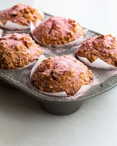 several muffins are sitting on a baking tray