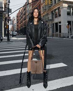 A mini dress, oversized leather jacket, studded boots, and a supple suede shoulder bag for the perfect day to night, classic yet edgy downtown NYC look. Oversized Leather Jacket, Rock N Roll Style, Studded Boots, The Perfect Day, City Bag, Day To Night