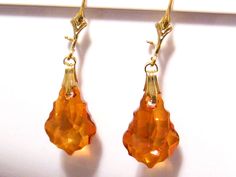 Swarovski Burnt Orange Crystal Earrings - Etsy Orange Pierced Earrings For Formal Occasions, Orange Drop Earrings For Anniversary, Formal Orange Pierced Earrings, Orange Dangle Earrings For Formal Occasions, Orange Clip-on Earrings For Formal Occasions, Orange Formal Earrings, Formal Orange Clip-on Earrings, Orange Teardrop Earrings For Formal Occasions, Orange Pierced Earrings For Wedding