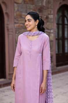 Lilac is a color that immediately relaxes and soothes the mind, making this an easy to wear kurta. This design is simplified and streamlined for everyday wear. Perfectly tailored with tucks and pleats, the printed detailing takes it up another notch. Kurta Patterns, Latest Dress Design, Kurta Style, Simple Kurti Designs, Kurti Designs Latest