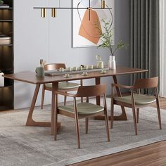 a dining table with four chairs around it