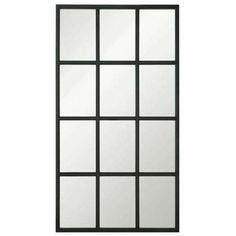 a black and white door with six panes