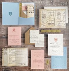 the wedding stationery is laid out on top of each other, including an envelope