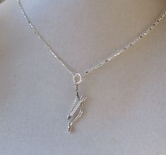 "Trendy bow and arrow charm in sterling attached to sterling \"dot/dash\" chain in either 16 or 18 inch length. Simple, trendy, minimalistic \"Merida\" from Brave necklace. Swarovski heart may be added to make it an \"I love archery\" necklace ~ please convo me if interested in this option. See picture with dime for size comparison." Merida Necklace, Brave Necklace, Merida From Brave, Trendy Bows, Swarovski Heart, Bow And Arrow, Disney Jewelry, Be Brave, Archery