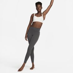 Whether it's yoga or a bike ride or a walk, you can move freely in our unbelievably soft Nike Zenvy leggings. Their InfinaSoft fabric is lightweight—but still squat-proof!—with softness that you can feel with every bend, stretch and shift. Fewer pockets give you a streamlined look, but the drop-in pocket at the center back is still big enough to hold your phone. Plus, they're durable enough for you to move, wash and wear again and again. Nike Compressive Bottoms For Yoga, Nike Stretch Sporty Yoga Pants, Nike Sporty Stretch Yoga Pants, Nike Stretch Yoga Pants, Nike Functional Yoga Bottoms, Nike Stretch Yoga Pants Sportswear, Nike Sportswear Tights For Yoga, Nike Stretch Yoga Pants For Pilates, Nike Compression Activewear For Light Exercise