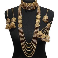 bridal jewellery set. Set includes- Necklace  Mala  Earrings  Jhumar  Tikka Gold Kundan Sets For Reception, Gold Kundan Bridal Accessories For Reception, Gold Temple Jewelry Sets For Reception, Gold Temple Jewelry Bridal Accessories, Gold Bridal Accessories With Intricate Design For Marriage, Festive Bridal Necklace With Stone Work For Marriage, Gold Bridal Sets For Reception And Diwali, Kundan Bridal Necklace For Diwali Marriage, Gold Temple Jewelry Bridal Accessories With Stone Work