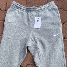 Grey Nike Joggers Nike Solo Swoosh Very Comfortable Rare Find Standard Fit / Tapered Leg Nike Gray Bottoms With Elastic Waistband, Grey Nike Joggers, Men Sweatpants, Clothing Art, Pants Nike, Wu Tang Clan, Nike Joggers, Nike Sweatpants, Cool Outfits For Men