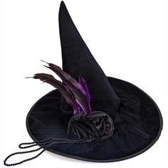 Skeleteen Classic Witch Headpiece is the ideal headwear for any woman dressing up as a cute witch for a carnival or Halloween. This big felt hat is made to fit most women's heads. The hat is made black felt and is 16 inches tall and wide. There are black roses and beads and purple feathers adorning the hat. Modern Witch Costume, Witchy Halloween Costumes, Witch Hats Costume, Black Witches, Purple Feathers, Hat With Flowers, Witch Accessories, Flowers Beads, Pointy Shoes