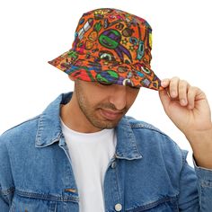 First, it protected fishermen from rain in the 1900s. Now, the personalized bucket hat is making its way to the very top of fashion picks for all ages. Choose the seam lines, add your zaniest designs and patterns on the bucket hat and make a modern wardrobe staple come to life.  .: Material: 100% polyester .: Available in 2 sizes .: Two stitching color options to pick from .: Sewn-in label .: Made in USA Retro Adjustable Bucket Hat For Summer, Adjustable Retro Bucket Hat For Summer, Retro Wide Brim Bucket Hat For Outdoor, Retro Multicolor Hats For Outdoor, Multicolor Bucket Hat For Summer Streetwear, Casual Multicolor Bucket Hat For Streetwear, Vintage Bucket Hat For Outdoor, Casual Adjustable Orange Bucket Hat, Retro Multicolor Bucket Sun Hat