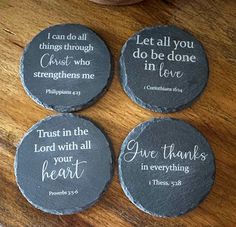 three stone coasters with bible verse on them