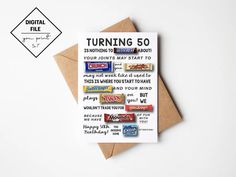 a greeting card with the words turning 50 on it and some candy bar stickers