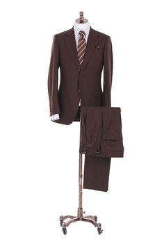 Brown Custom Suit Timeless brown suit is a staple to anyone's wardrobe. The brown is versatile and is great for everyday office wear. Additionally, the brown suit jacket dresses up a pair of jeans wonderfully.  Features: Brown wool fabric Full lining Single-breasted jacket with notch lapels Horn buttons Customize it: All of our clothing is handcrafted at the time of order. This provides you the opportunity to customize the clothing however you like. Free monogramming included! Inside the left jacket will say "Handcrafted for First Last name". If you want something else monogrammed, just let us know in the personalization section below!  Make it even better: Add a custom photo collage lining inside the jacket! View and add to your cart here: https://www.etsy.com/listing/1754734281/custom-co Classic Brown Three-piece Suit For Formal Occasions, Luxury Brown Three-piece Suit With Notch Lapel, Luxury Tailored Brown Three-piece Suit, Tailored Brown Three-piece Suit For Formal Occasions, Tailored Brown Three-piece Formal Suit, Brown Tailored Three-piece Suit For Formal Occasions, Tailored Brown Three-piece Suit For Semi-formal Events, Tailored Brown Three-piece Suit For Semi-formal Occasions, Semi-formal Brown Double Breasted Suit With Welt Pockets