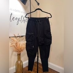 Men’s Black Cargo Jogger Pants Nwot Color: Black Size: M Waist: 13.5” + Stretchy Up To 20” Hip: 21” + Stretchy Up To 24” Length: 37” Black Cargo Sweatpants For Outdoor Activities, Black Cargo Style Sweatpants For Outdoor, Black Sweatpants With Multiple Pockets For Outdoor, Black Sweatpants With Pockets For Outdoor, Black Techwear Sweatpants With Multiple Pockets, Functional Black Pants With Side Pockets, Fitted Black Cargo Pants For Outdoor, Functional Black Cargo Pants, Urban Black Sweatpants For Outdoor Activities