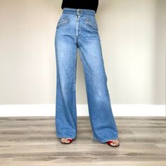 Perfect worn light weight denim. 60s 70s wide leg, high waisted jeans with sewn details. In excellent vintage condition.  Waist 27" Retro Wide Leg Light Wash Flare Jeans, Light Wash High Rise Retro Flare Jeans, Retro High Rise Light Wash Flare Jeans, Retro High Waist Light Wash Flare Jeans, Vintage High Rise Flare Jeans For Spring, Retro Full-length Light Wash Flare Jeans, Vintage Light Wash Pants For Spring, Retro Light Wash Denim Flare Jeans, Retro Light Wash Flare Jeans