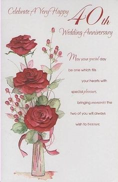 an anniversary card with red roses in a vase