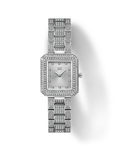 Embrace the essence of timeless beauty with Arc. A watch for all, the Arc single comes with a jewel-shaped 23mm x 25mm rectangular case, crowned by a crystal-studded bezel. Twelve genuine diamonds punctuate each hour on the sunray-finished dial, elegantly framed by a distinctive three-link bracelet, and generously adorned with 752 twinkling crystals. The Arc Single is more than a timepiece - it's an everyday symbol of elegance. Timeless Rectangular Diamond Watch For Evening, Rectangular Diamond Watch With Diamond Hour Markers For Evening, Timeless Rectangular Diamond Watch With Metal Dial, Elegant Rectangular Diamond Watch With Metal Dial, Elegant Diamond Rectangular Watch, Elegant Rectangular Diamond Watch, Diamond Watch With Rectangular Dial For Evening, Silver Diamond Watch With Rectangular Dial For Evening, Timeless Rectangular Diamond Watch